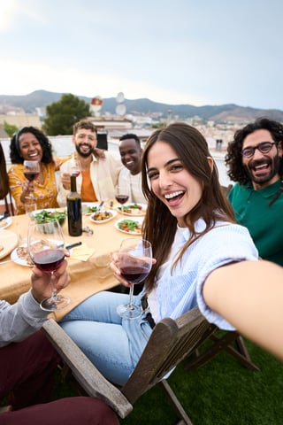 Friends celebrating at rooftop party